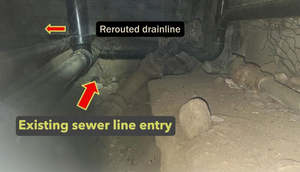 Rodent droppings and soil disruption near former sewer pipe penetration in Pasadena crawlspace